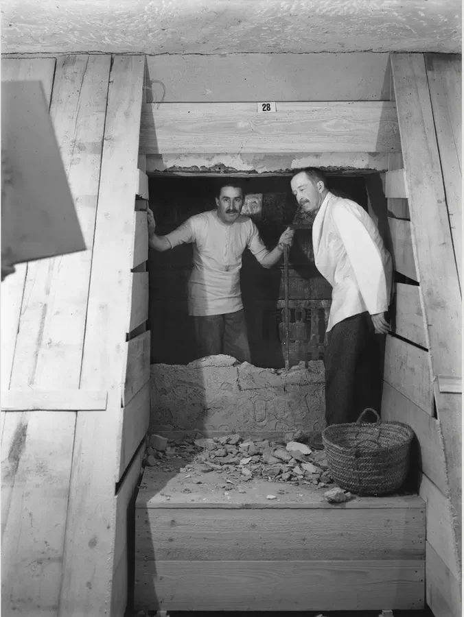 Burton staged his photos to make them as dramatic as possible; taken in February 1923, this image is one of only two showing Carter (left) and Lord Carnarvon together in the tomb.